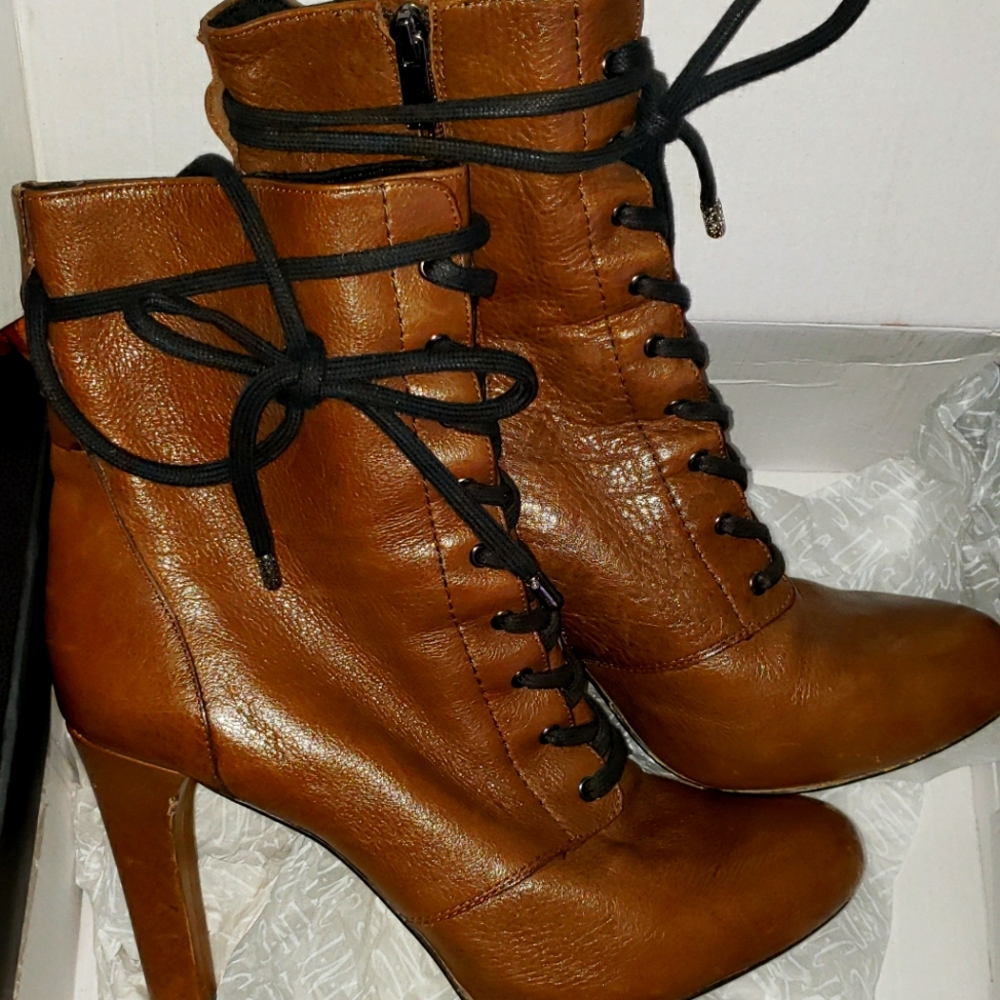 Previously loved INC MID CALF BOOT 4inch heel Olive green.